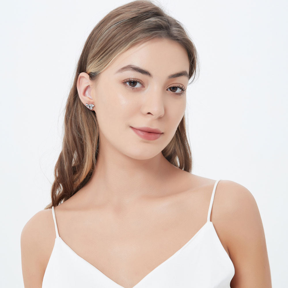 Model wearing 3-Stone Cluster Marquise CZ Stud Earrings in Sterling Silver, 3 of 3