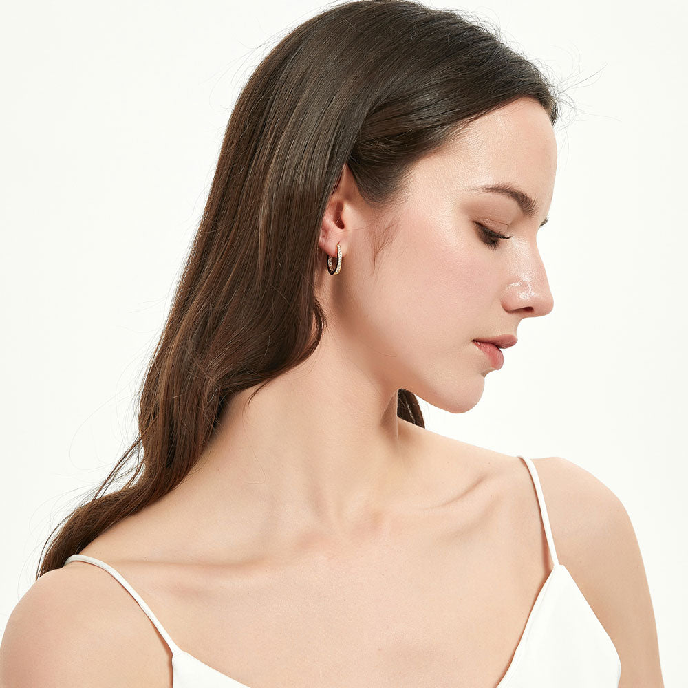 Model wearing Oval Bar CZ Small Hoop Earrings in Sterling Silver 0.7 inch, Yellow Gold Flashed