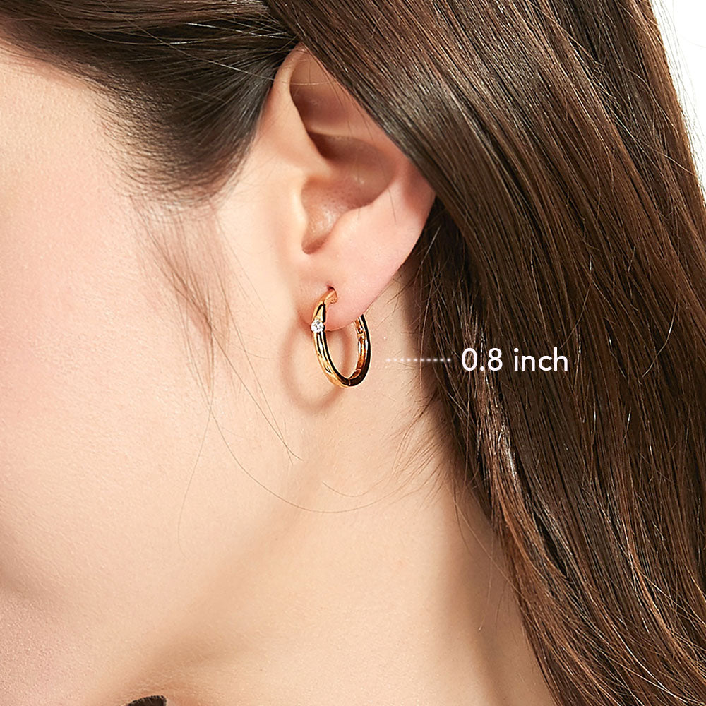 Model wearing Solitaire CZ Small Hoop Earrings in Gold Flashed Sterling Silver, 0.8 inch