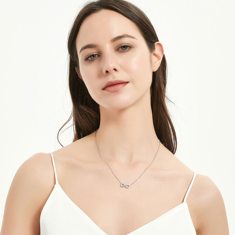Model wearing Infinity CZ Pendant Necklace in Sterling Silver, 3 of 5
