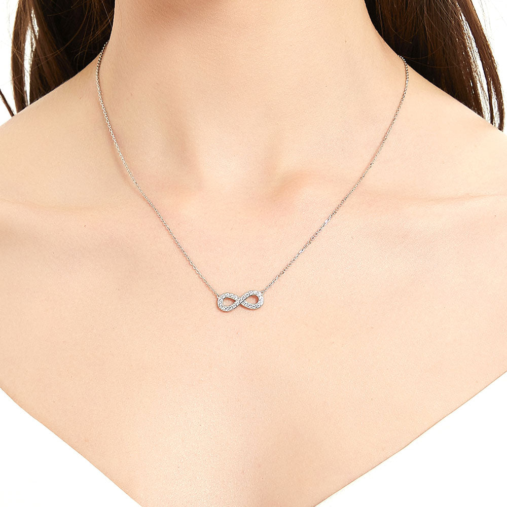 Model wearing Infinity CZ Pendant Necklace in Sterling Silver, 2 of 5