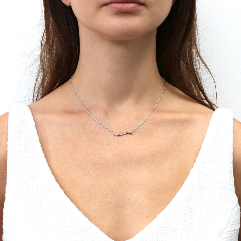 Model wearing Wave Pendant Necklace in Sterling Silver, 2 of 6