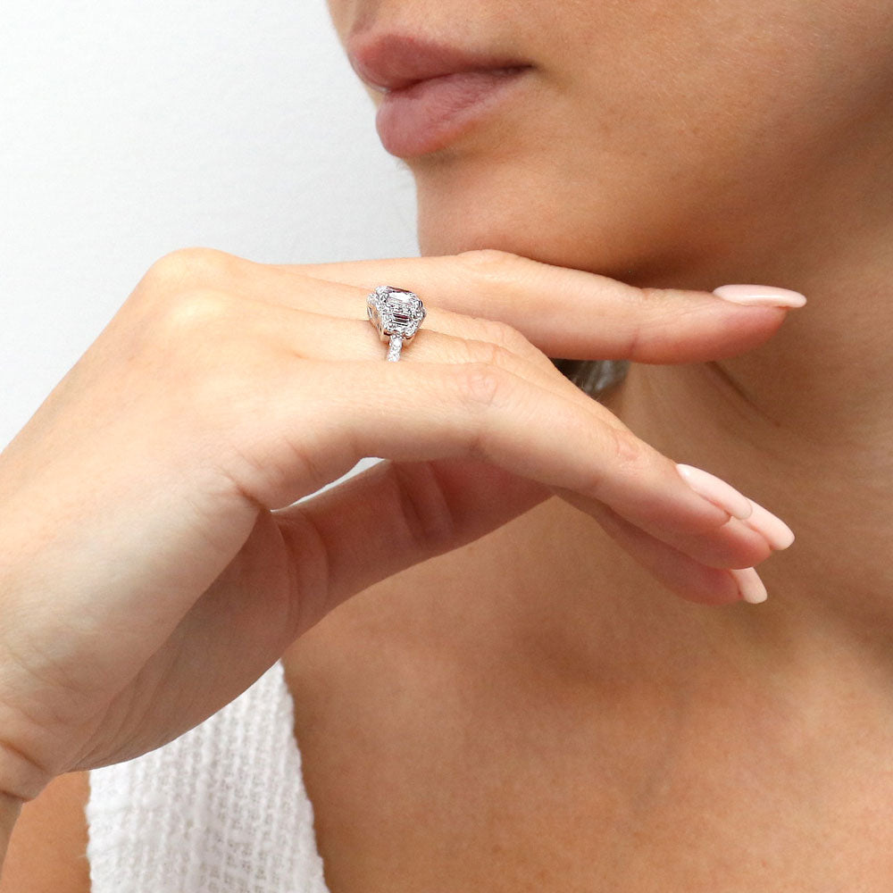 Model wearing 3-Stone Halo Cushion CZ Ring in Sterling Silver, 7 of 11