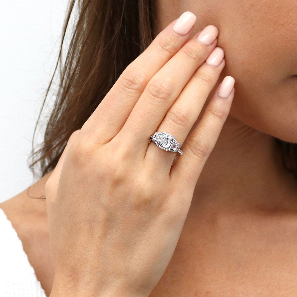 Model wearing 3-Stone Halo Cushion CZ Ring in Sterling Silver, 3 of 11