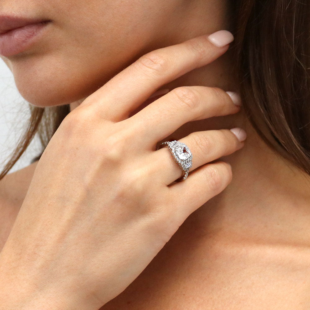 Model wearing 3-Stone Halo Cushion CZ Ring in Sterling Silver, 2 of 11
