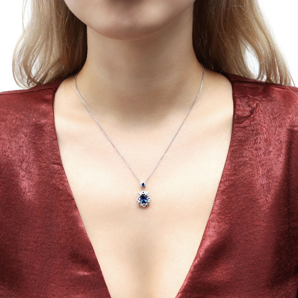 Flower Halo Simulated Blue Sapphire CZ Necklace in Sterling Silver