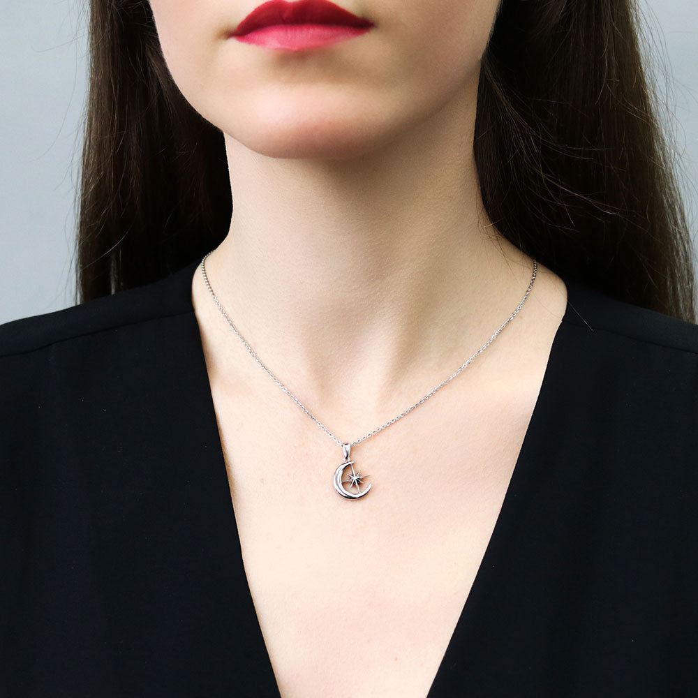 Model wearing Crescent Moon North Star Necklace and Earrings Set in Sterling Silver, 9 of 13