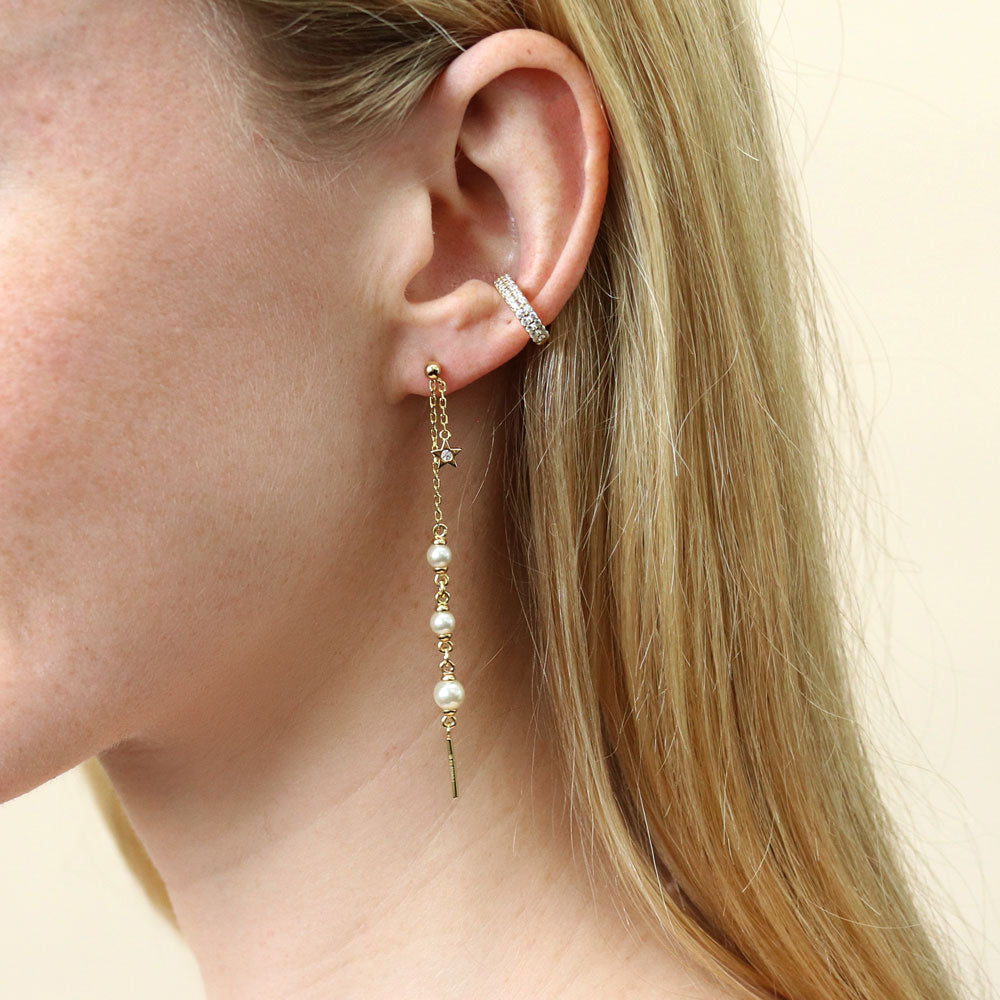 Model wearing CZ Ear Cuff Cartilage Earrings in Sterling Silver, Yellow Gold Flashed