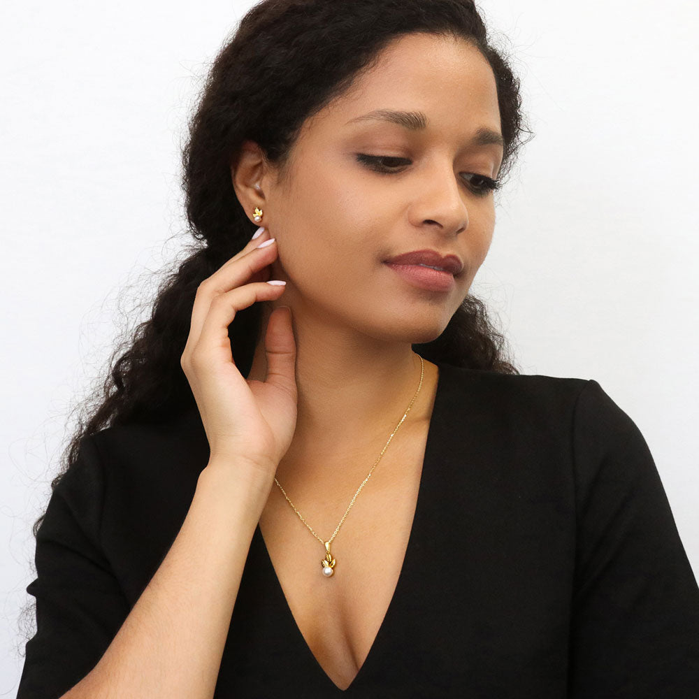 Model wearing Leaf Imitation Pearl Set in Gold Flashed Sterling Silver, 2 of 9