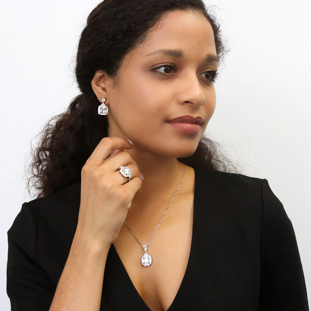 Model wearing Arrow Halo CZ Necklace and Earrings Set in Sterling Silver, 3 of 9