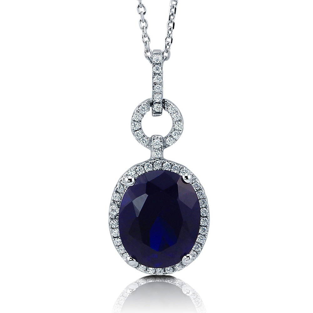 Halo Simulated Blue Sapphire Oval CZ Set in Sterling Silver