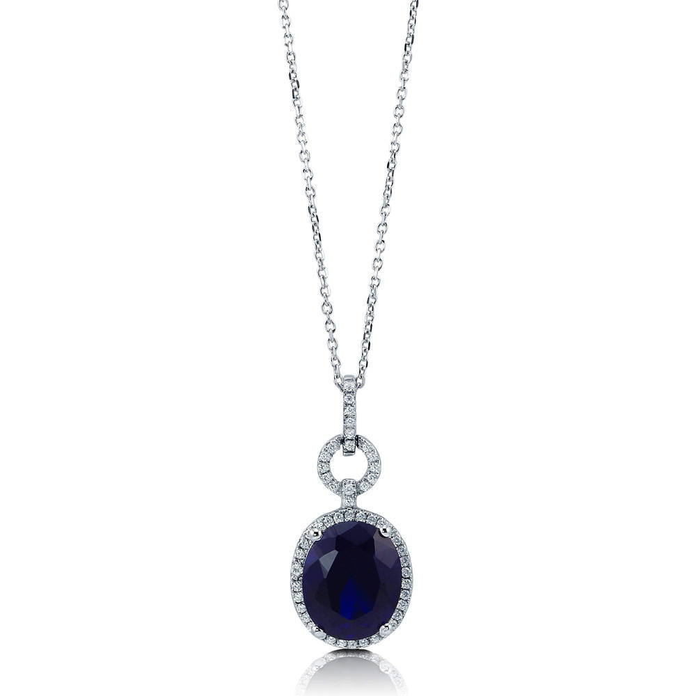 Halo Simulated Blue Sapphire Oval CZ Set in Sterling Silver