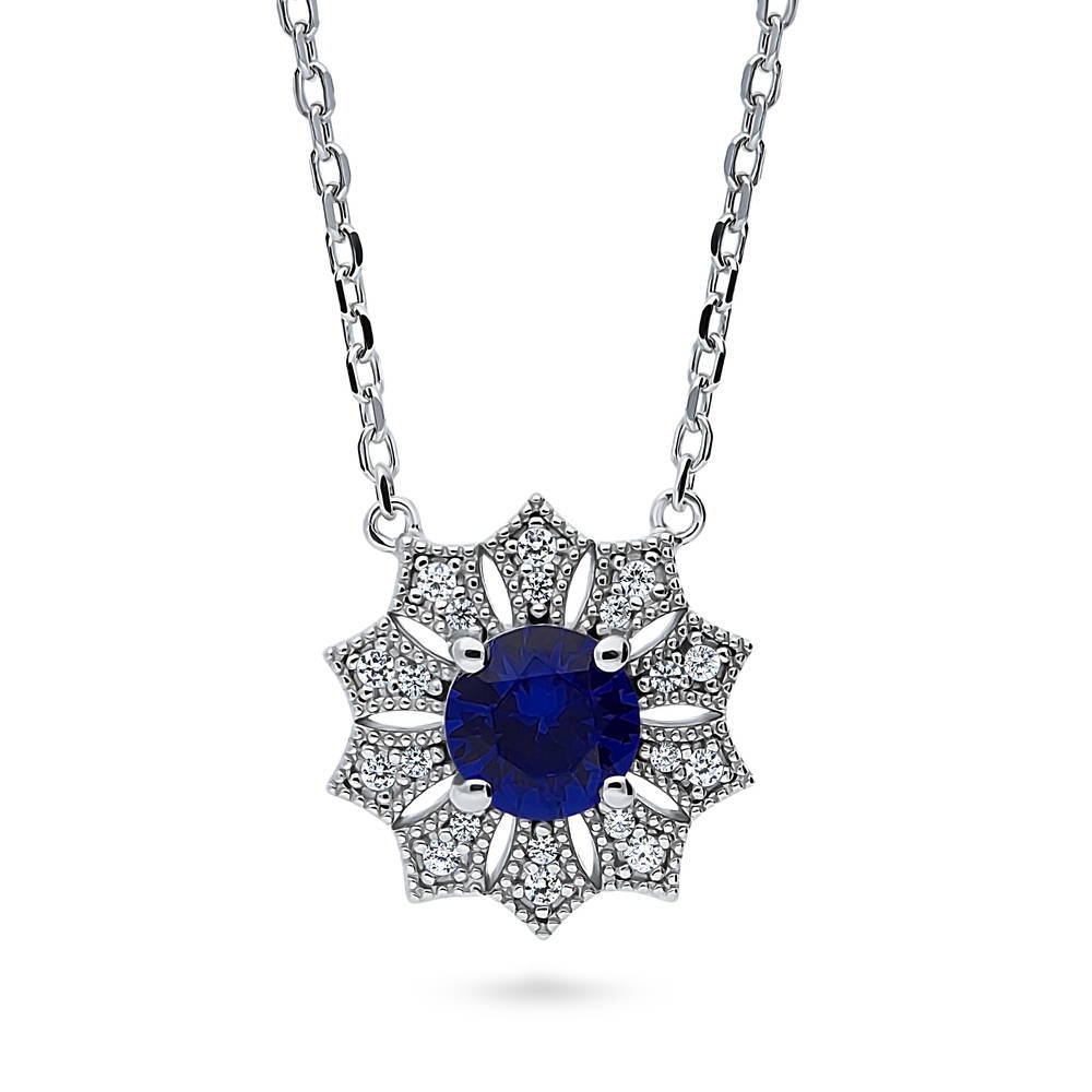 Halo Flower Blue Round CZ Pendant Necklace in Sterling Silver