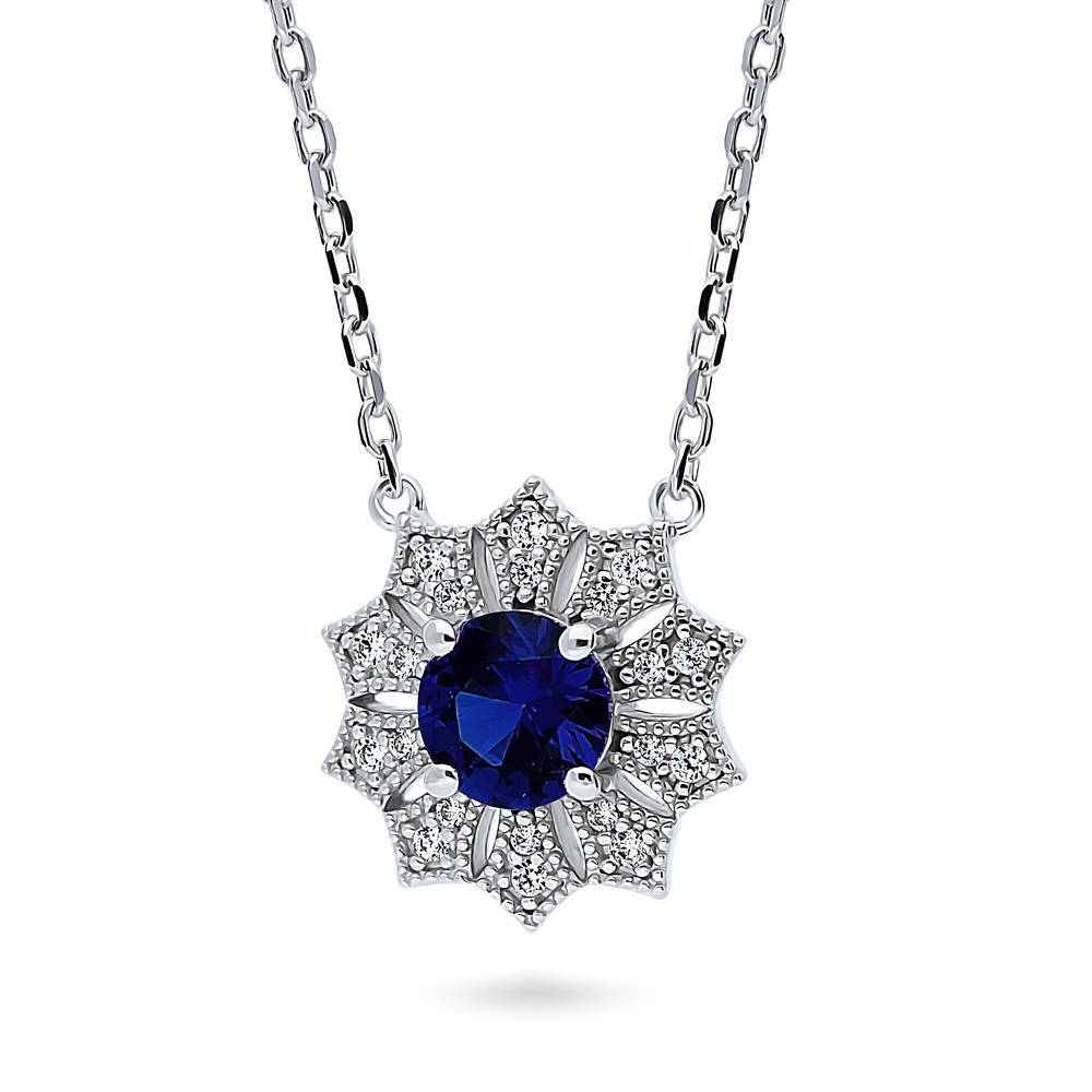 Halo Flower Blue Round CZ Pendant Necklace in Sterling Silver