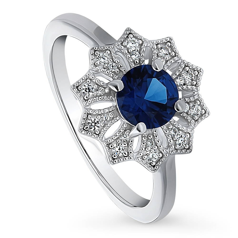 Flower Halo Blue CZ Ring in Sterling Silver