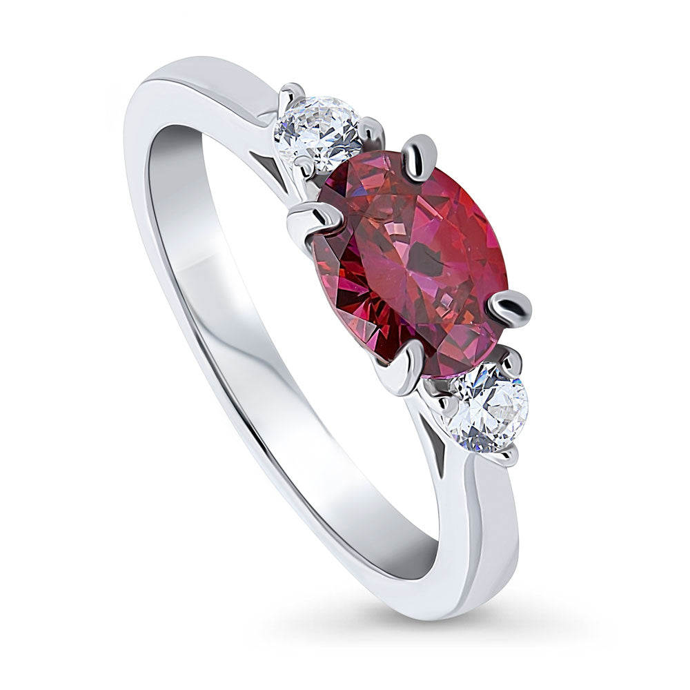 Front view of 3-Stone East-West Red Oval CZ Ring in Sterling Silver, 4 of 7