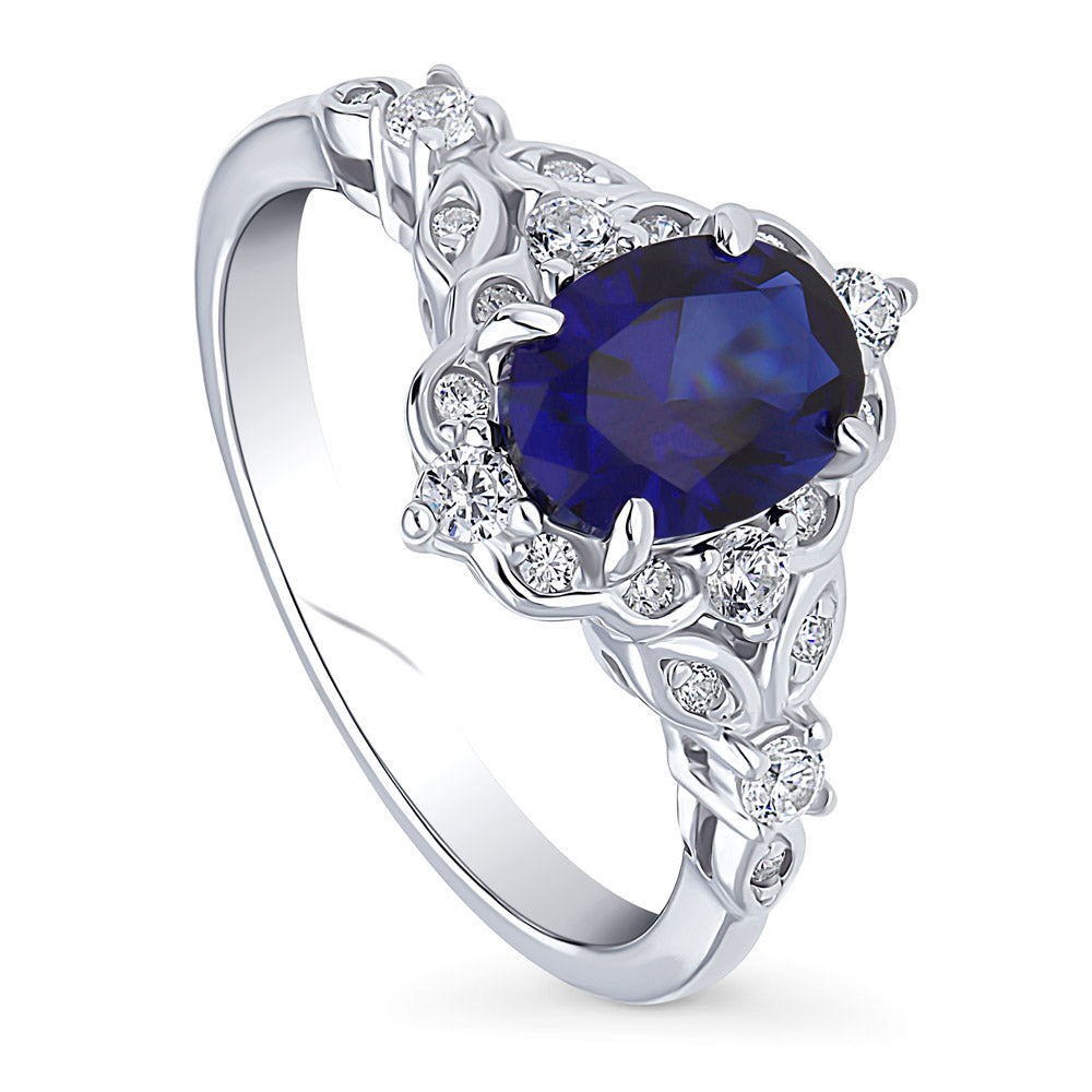 Halo Art Deco Simulated Blue Sapphire Oval CZ Ring in Sterling Silver