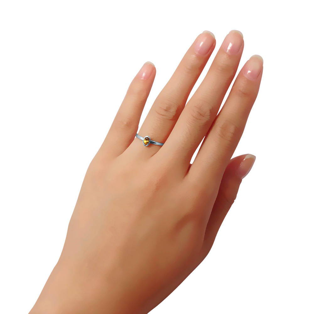 Solitaire Bezel Set Oval Citrine Ring in 10K White Gold