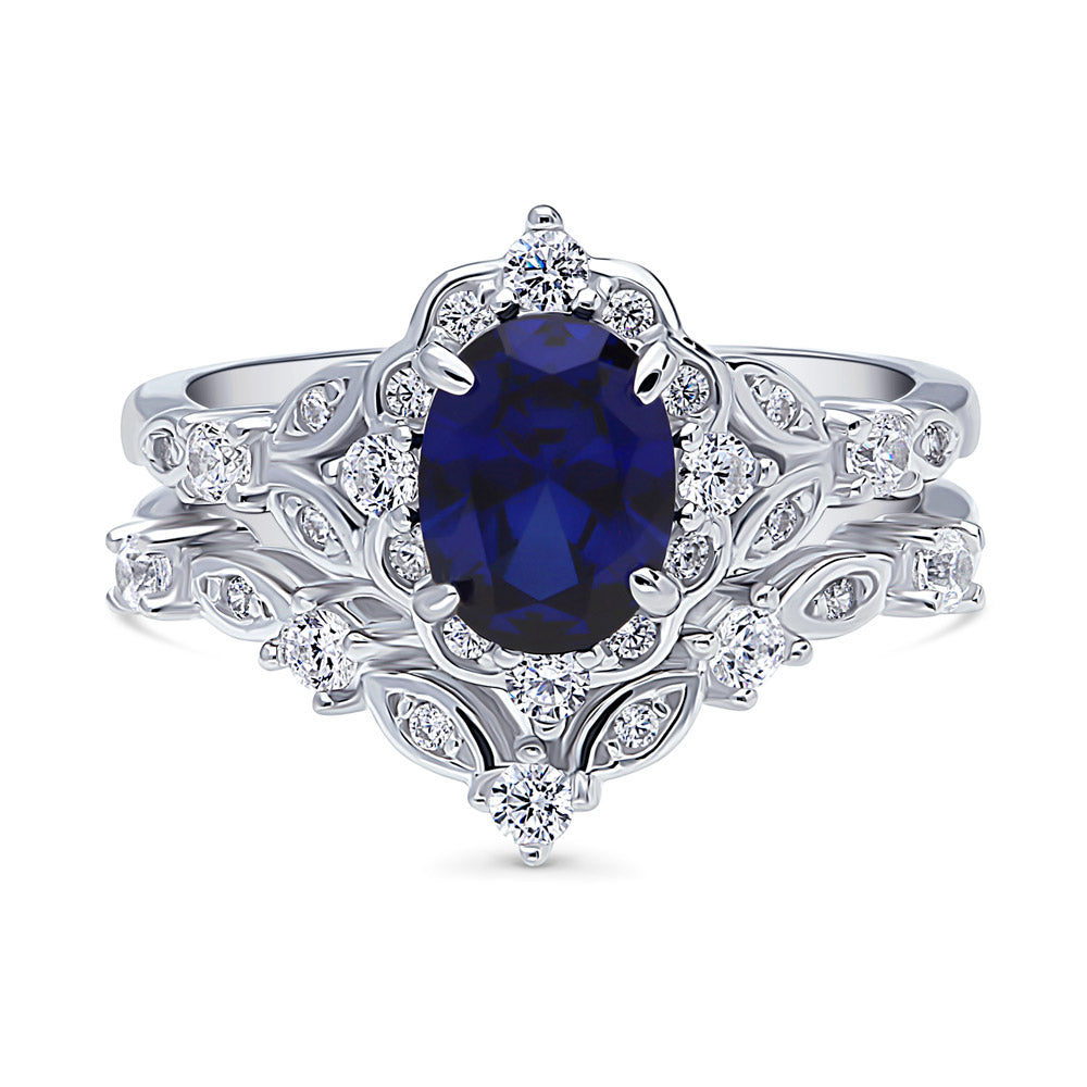 Chevron Halo Simulated Blue Sapphire CZ Ring Set in Sterling Silver