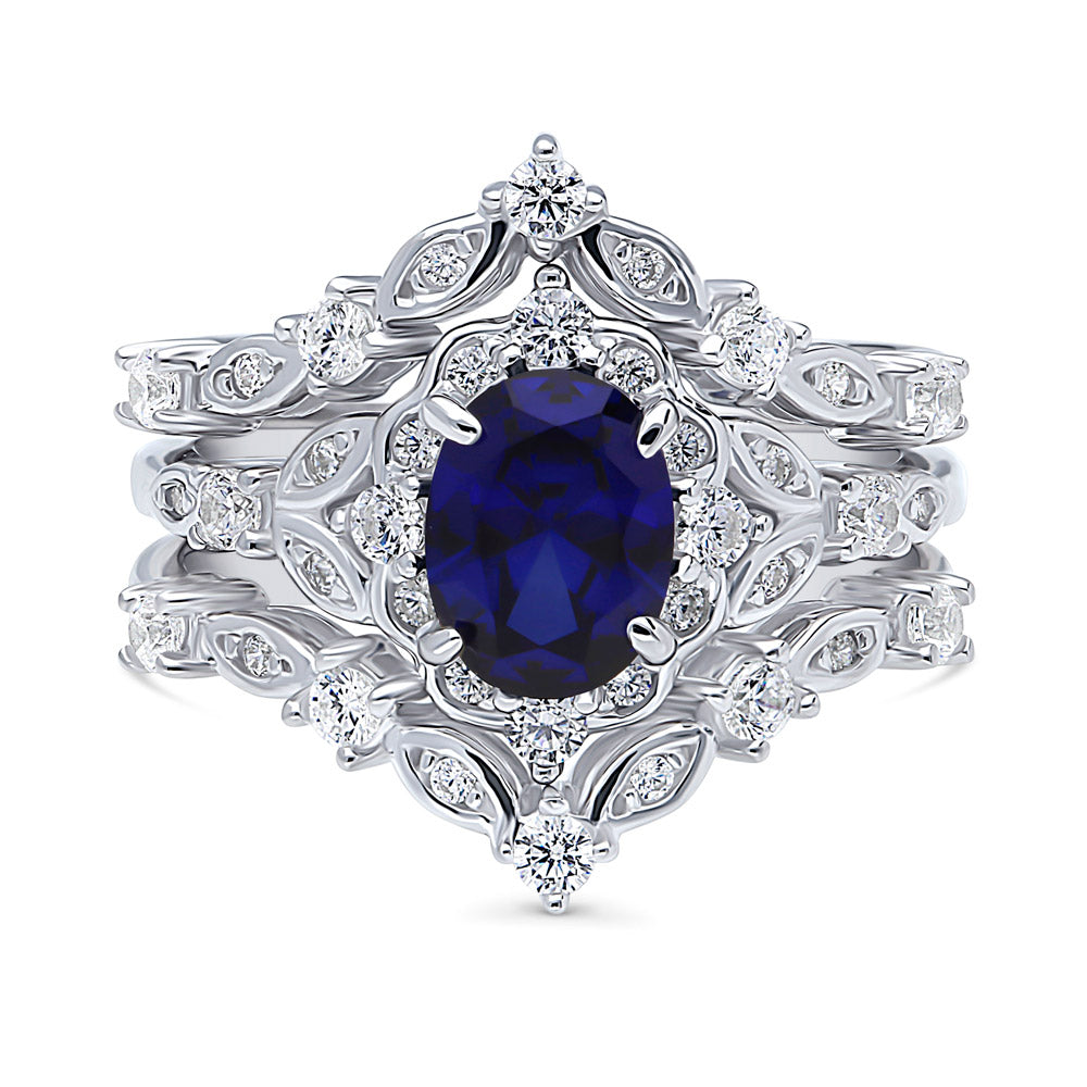 Chevron Halo Simulated Blue Sapphire CZ Ring Set in Sterling Silver