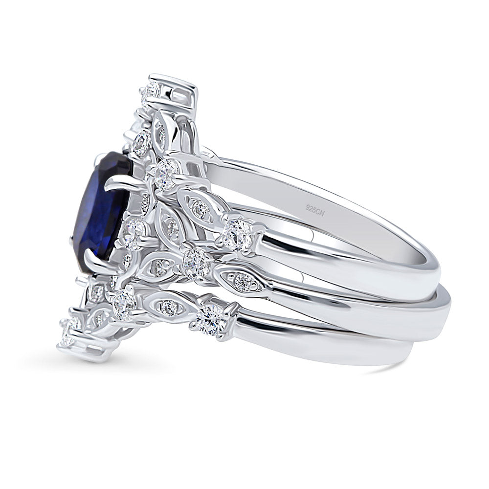 Chevron Halo Simulated Blue Sapphire CZ Ring Set in Sterling Silver