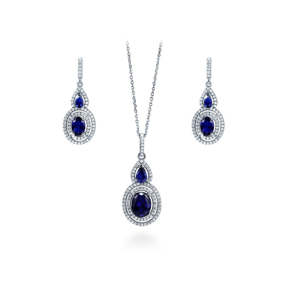 Halo Simulated Blue Sapphire Oval CZ Set in Sterling Silver