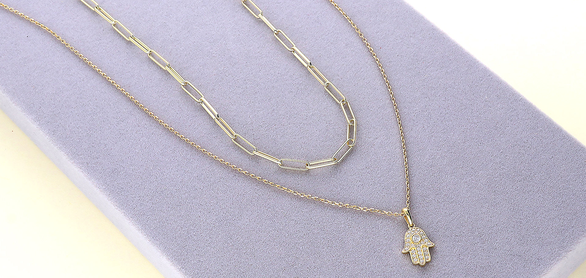 Paperclip chain layer with a petite pendant necklace