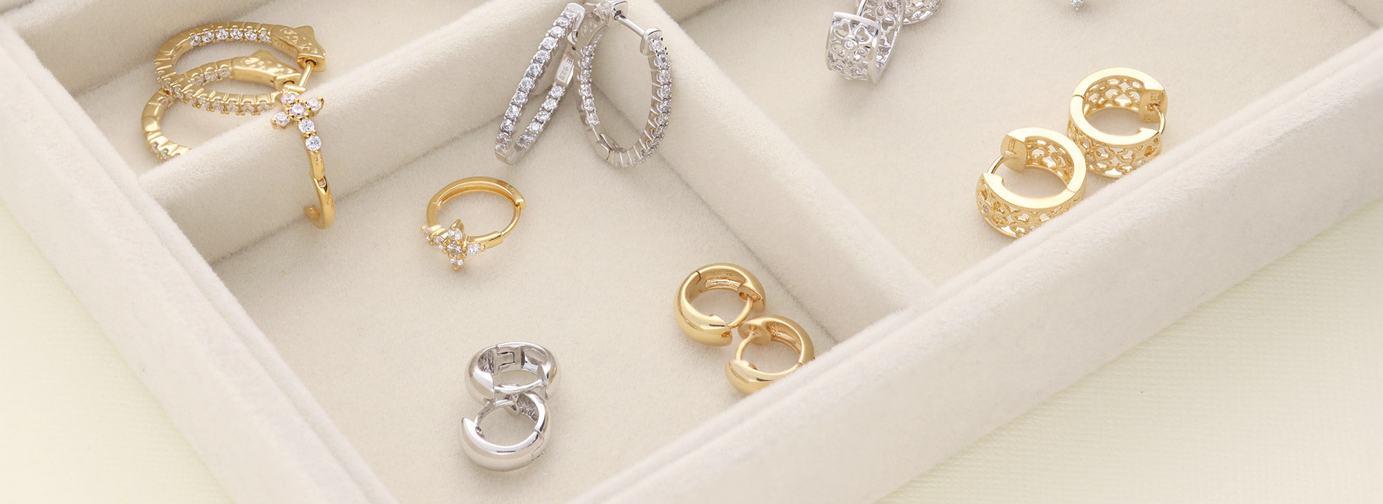 Shop gold hoops and shop silver hoops