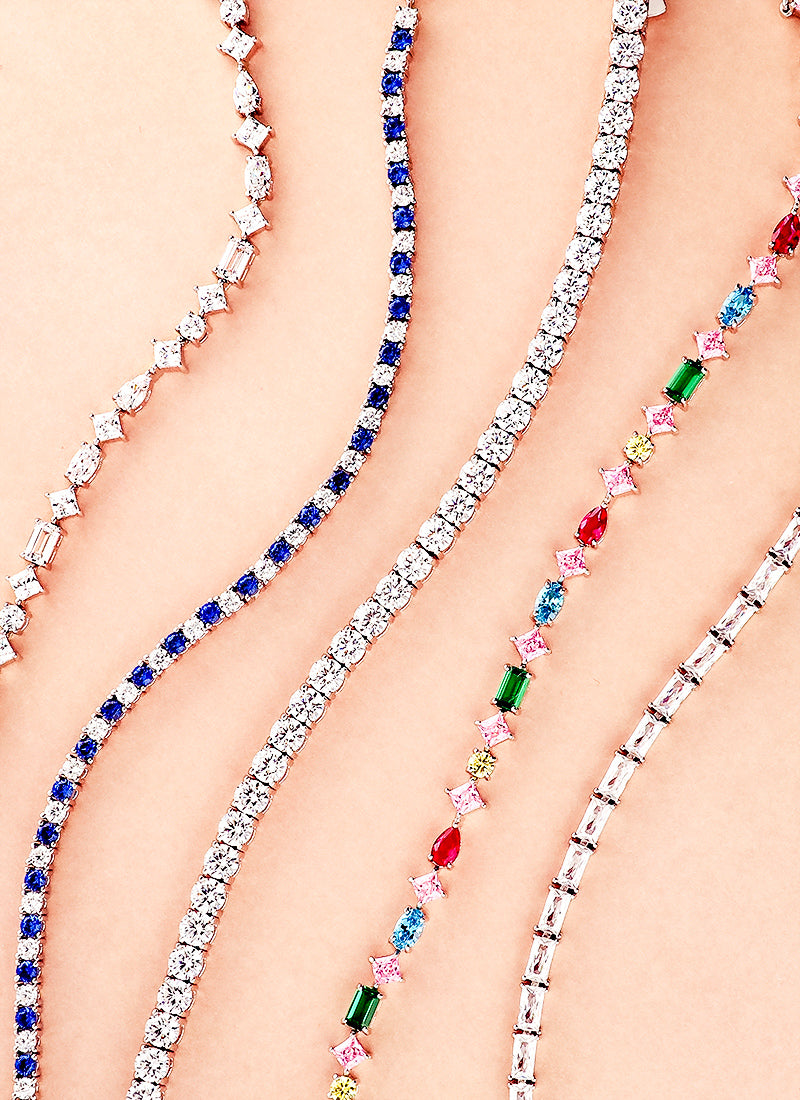 Assorted tennis bracelets made with clear and colorful cubic zirconia and sterling silver at Berricle