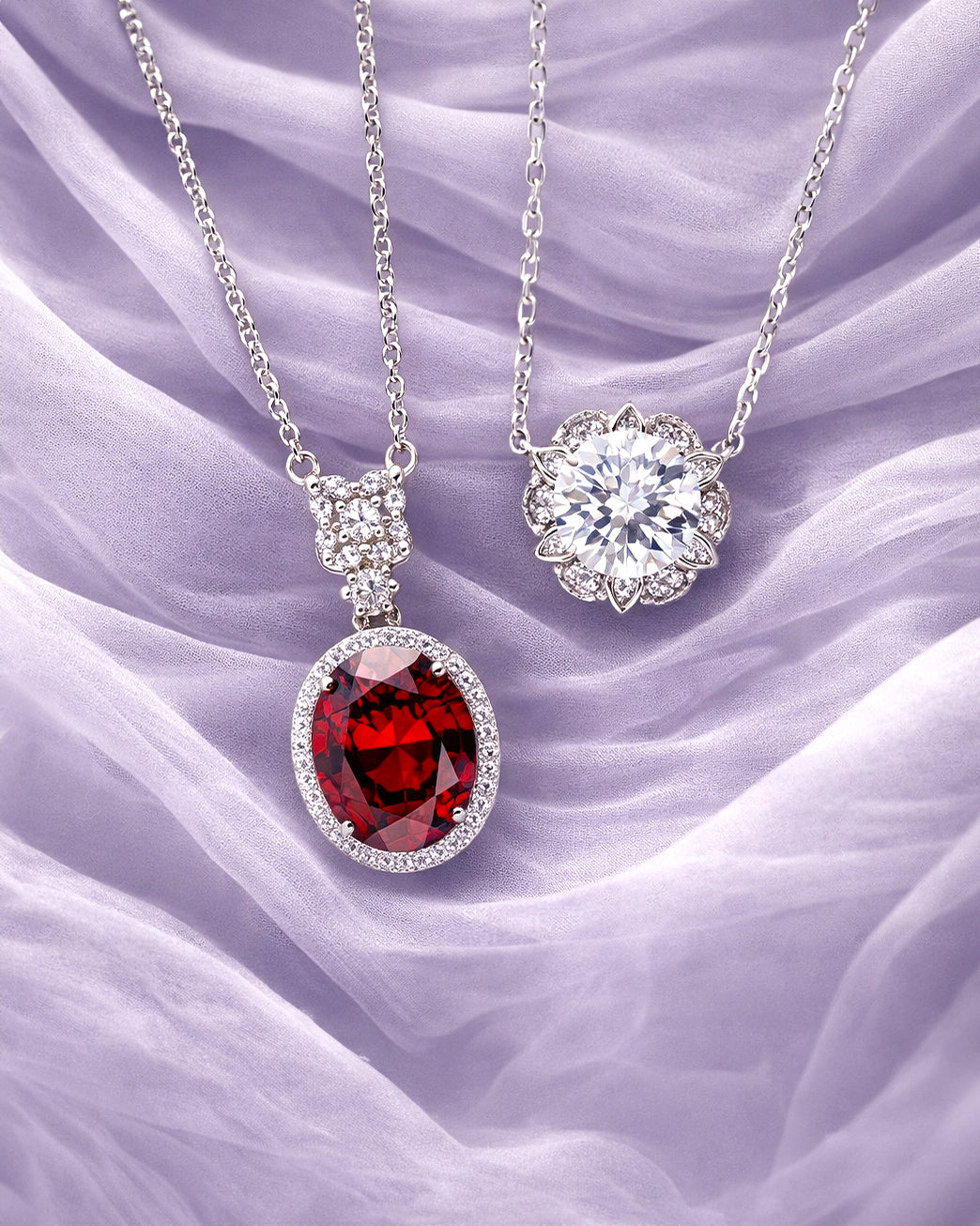 Two necklaces with CZ on a soft purple fabric background