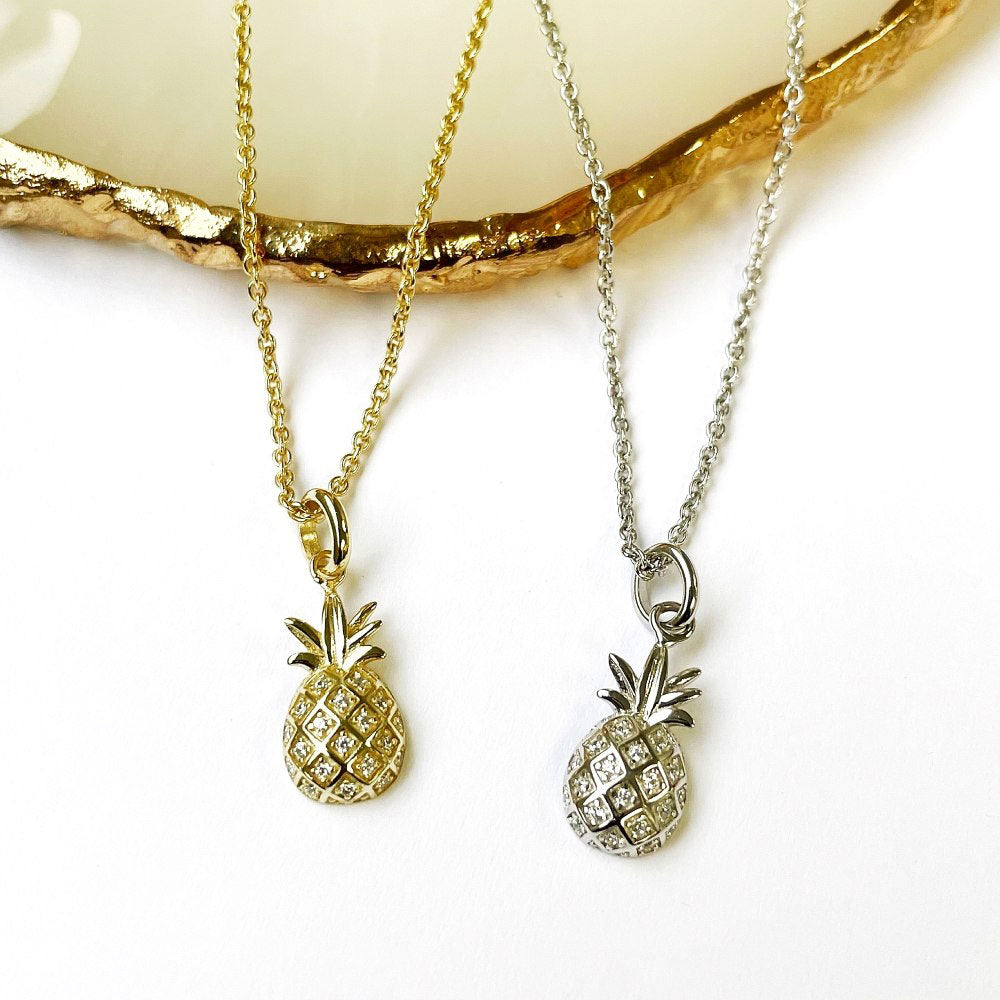 Flatlay view of Pineapple CZ Necklace in Sterling Silver