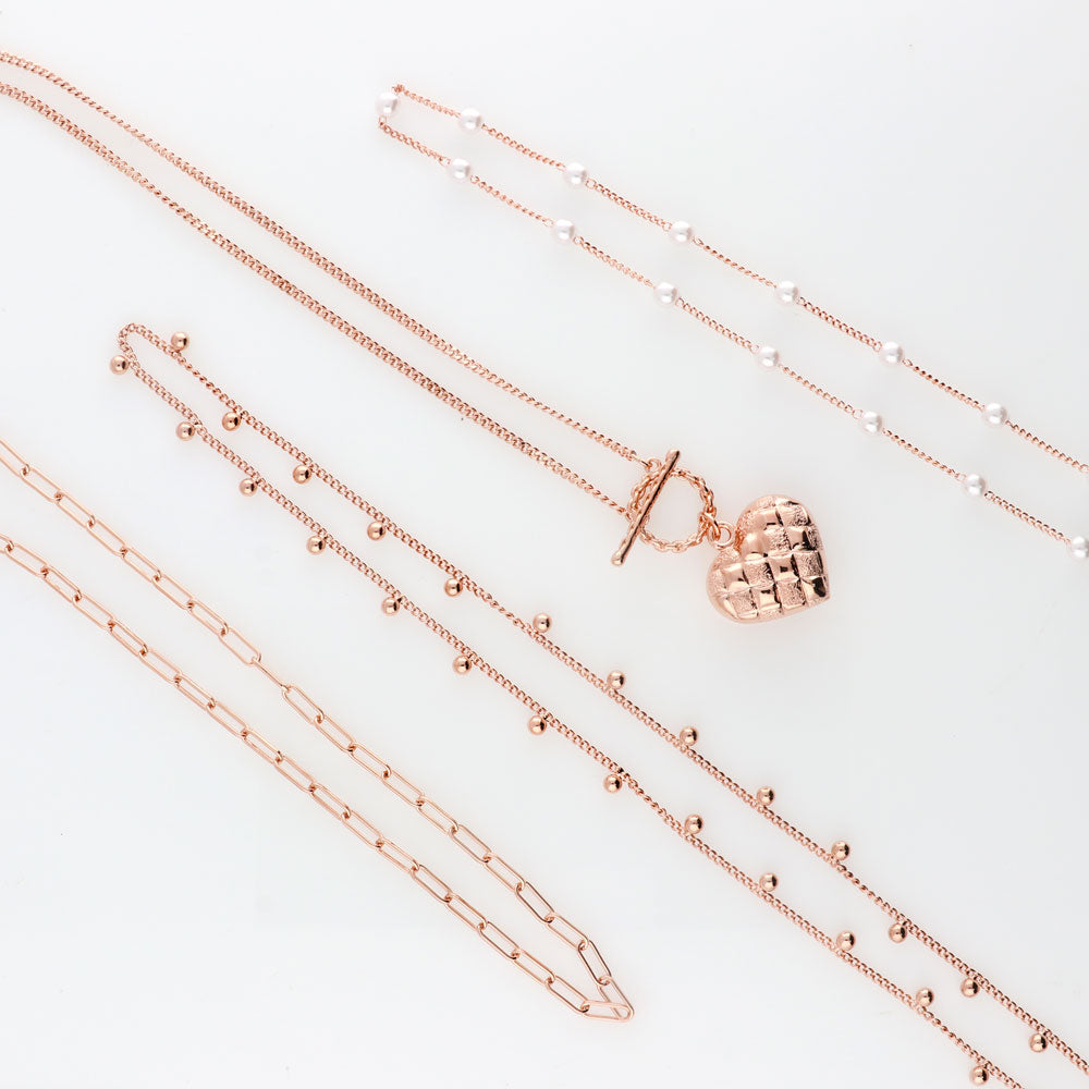 Flatlay view of Imitation Pearl Station Necklace, Rose Gold Flashed