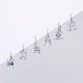Flatlay view of Solitaire Emerald Cut CZ Leverback Earrings in Sterling Silver, Yellow Gold Flashed