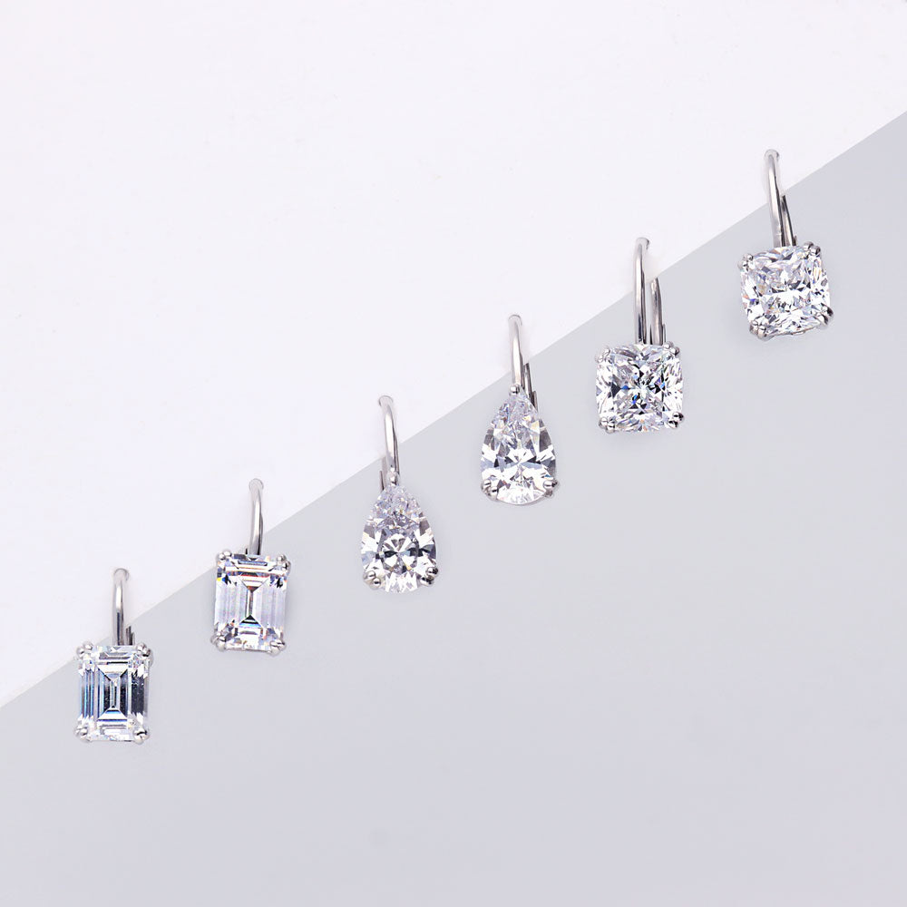 Flatlay view of Solitaire Emerald Cut CZ Leverback Earrings in Sterling Silver, Yellow Gold Flashed