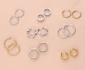 Flatlay view of Cable Small Hoop Earrings in Sterling Silver 0.9 inch
