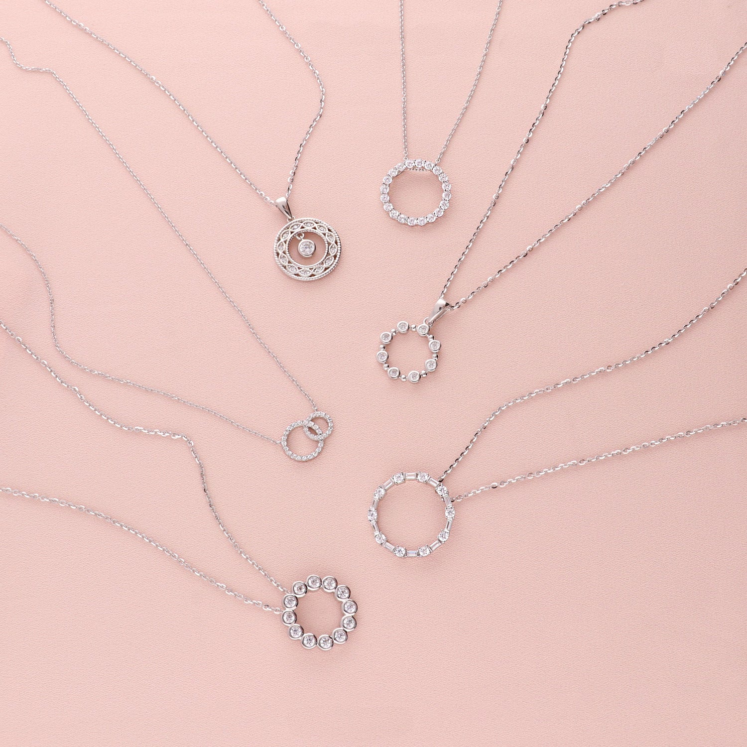 Flatlay view of Open Circle Interlocking CZ Necklace in Sterling Silver, 6 of 7