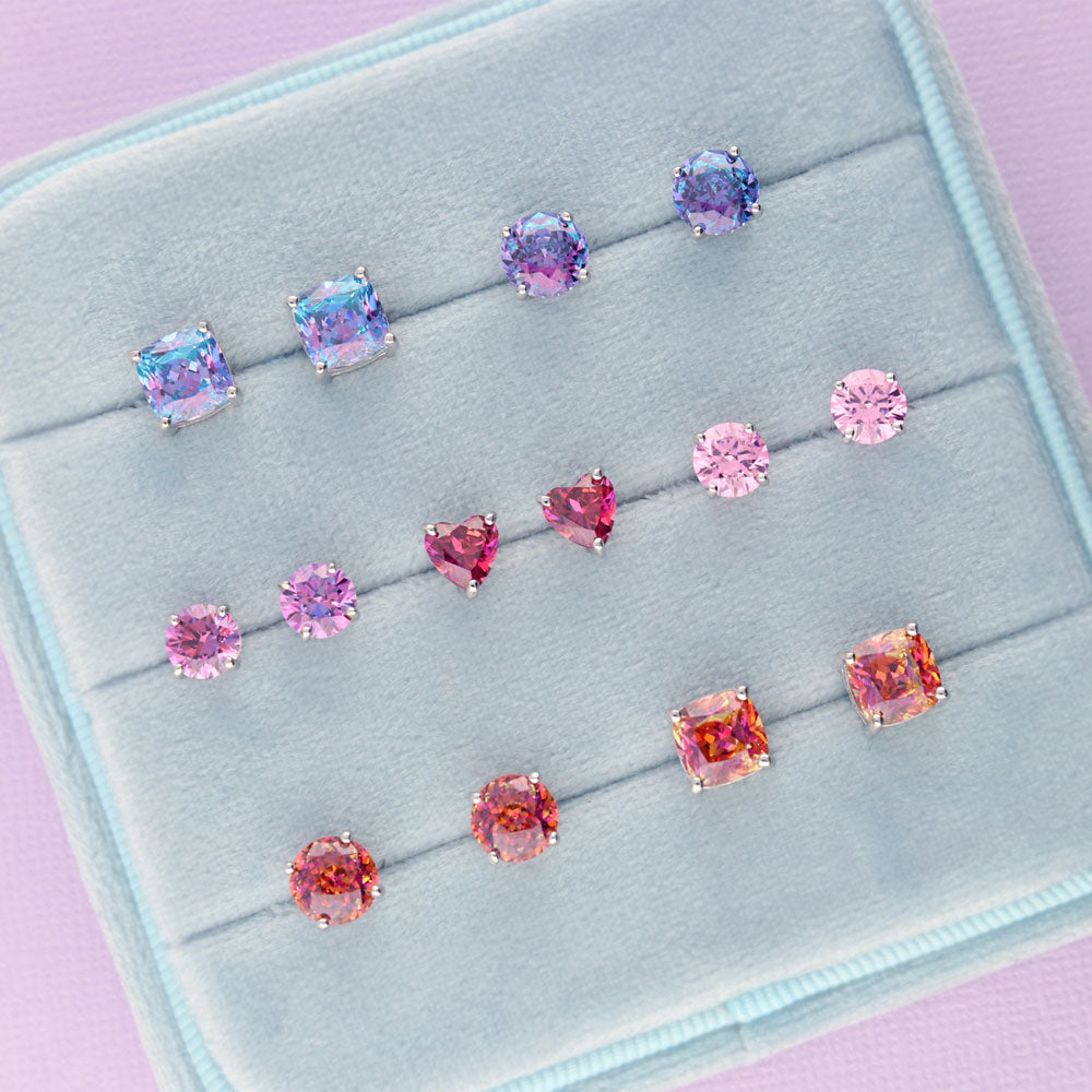 Flatlay view of Solitaire Heart Red Heart CZ Stud Earrings in Sterling Silver, 4 of 4