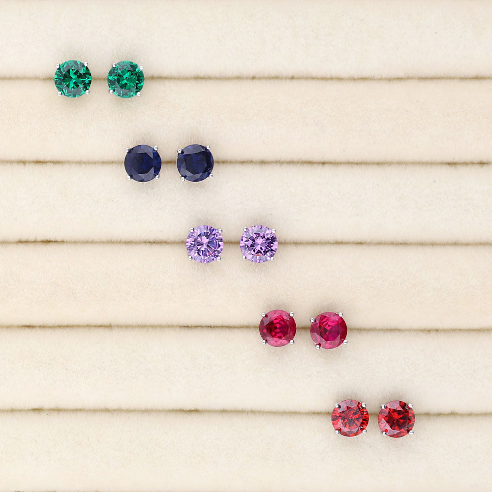 Flatlay view of Solitaire 1.6ct CZ Cartilage Stud Earrings in Sterling Silver, Amethyst