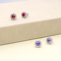 Flatlay view of Halo Kaleidoscope CZ Stud Earrings in Sterling Silver, Red Orange Color