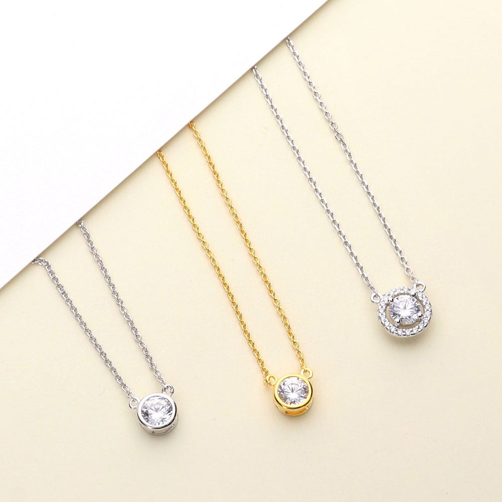 Flatlay view of Halo CZ Pendant Necklace in Sterling Silver, Yellow Gold Flashed