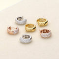 Flatlay view of Dome CZ Mini Cartilage Huggie Earrings in Sterling Silver 0.5 inch