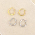 Flatlay view of Filigree Small Hoop Earrings in Sterling Silver 0.8 inch