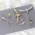 Flatlay view of Dragonfly Button Cultured Pearl Pin in Sterling Silver