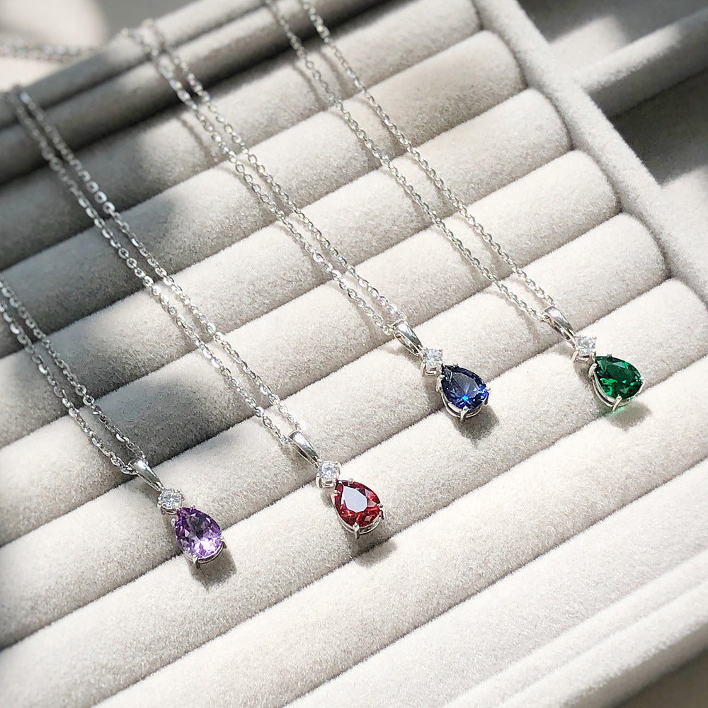 Flatlay view of Solitaire 2-Stone 1ct Pear CZ Set in Sterling Silver