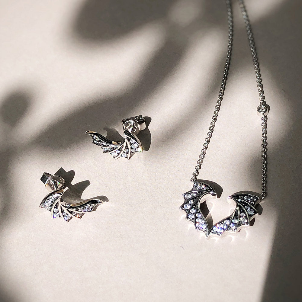 Flatlay view of Bat Wings CZ Stud Earrings in Sterling Silver, 3 of 4