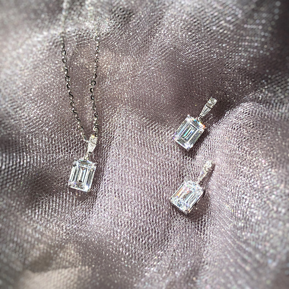 Flatlay view of Solitaire 1.7ct Emerald Cut CZ Necklace in Sterling Silver, 2 of 4