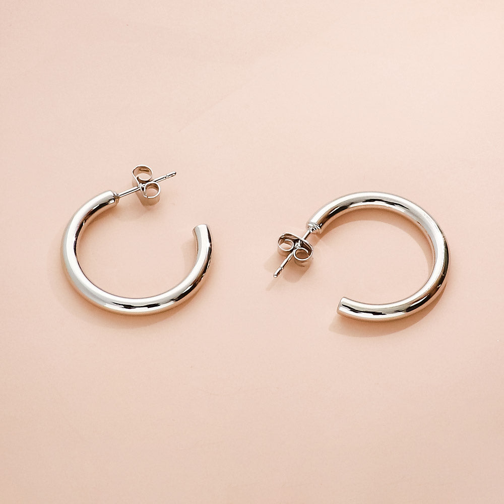 Flatlay view of Medium Hoop Earrings 0.98 inch, Gold-Tone