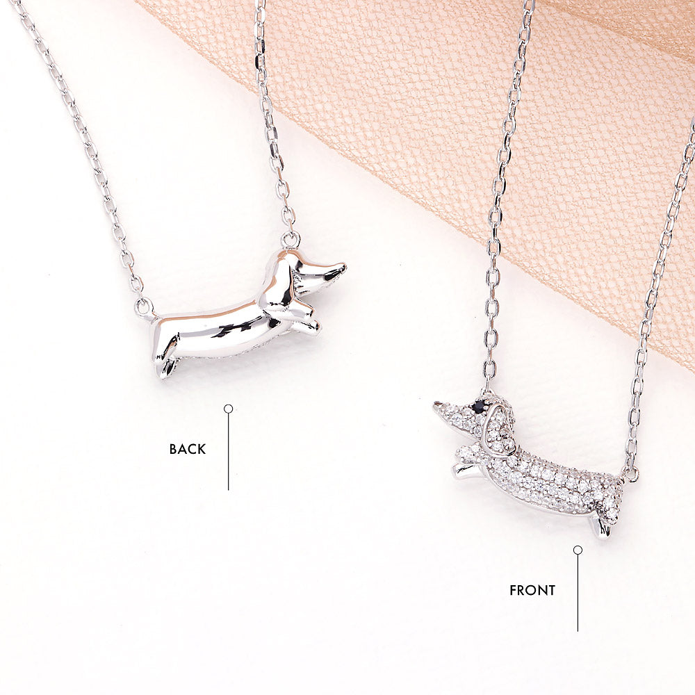 Flatlay view of Puppy CZ Pendant Necklace in Sterling Silver, 3 of 6