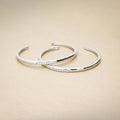 Flatlay view of CZ Cuff in Sterling Silver, Yellow Gold Flashed