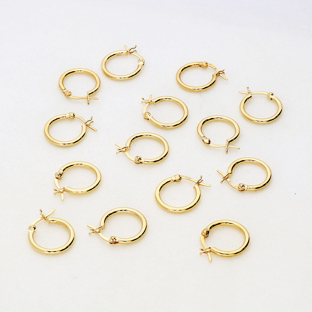Flatlay view of Small Hoop Earrings in Sterling Silver 0.6 inch, Yellow Gold Flashed